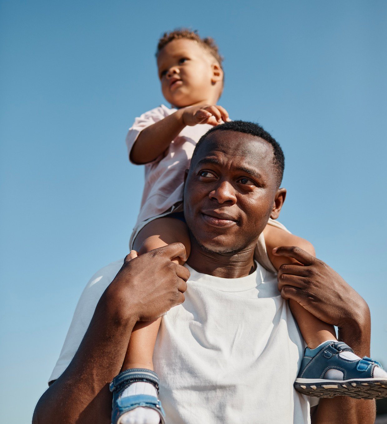 What rights do fathers have to children born out of wedlock in South Africa?